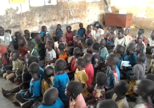 Teacher with students